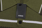 AMIRI Striped Pointelle-Knit Polo Shirt